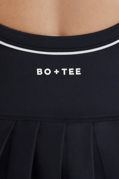 Soft Active Crossback Pleated Tennis Dress in Black