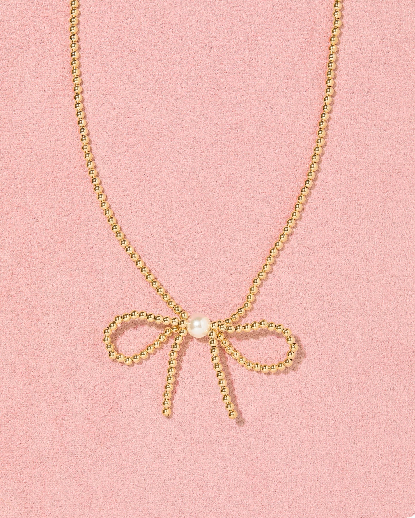 Gold Beaded Bow Necklace